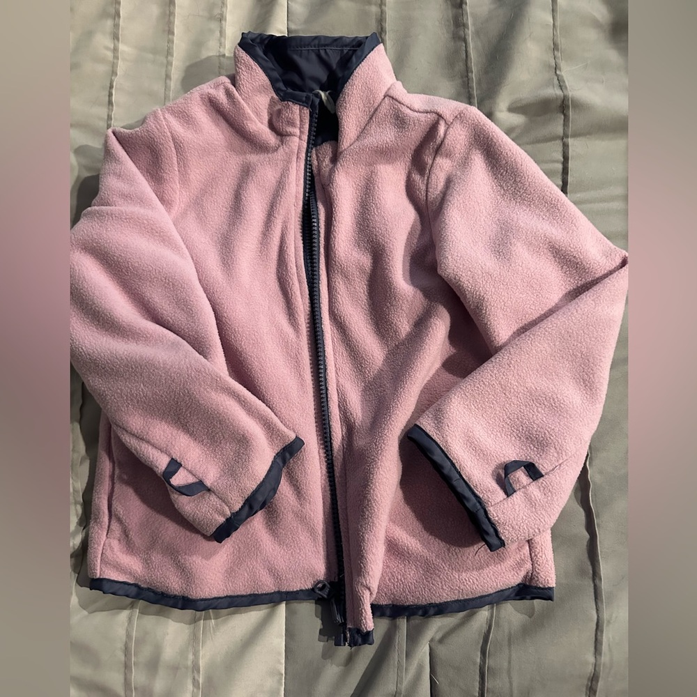 Pink fleece kids jacket. No tag, was cut out... coat in good shape. 2T or 3T.